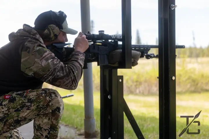 Kneeling barricade position in camo