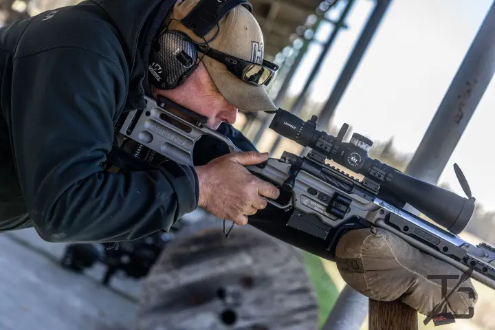 Tight grip on the chassis, glassing downrange