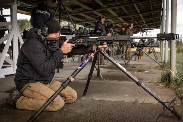 Kneeling tripod position with rifle