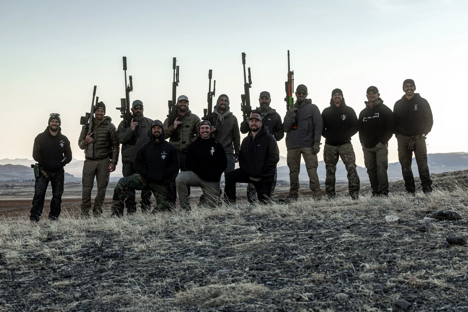 The Cadre instructor team lined up with their rifles at The Invite, 2024
