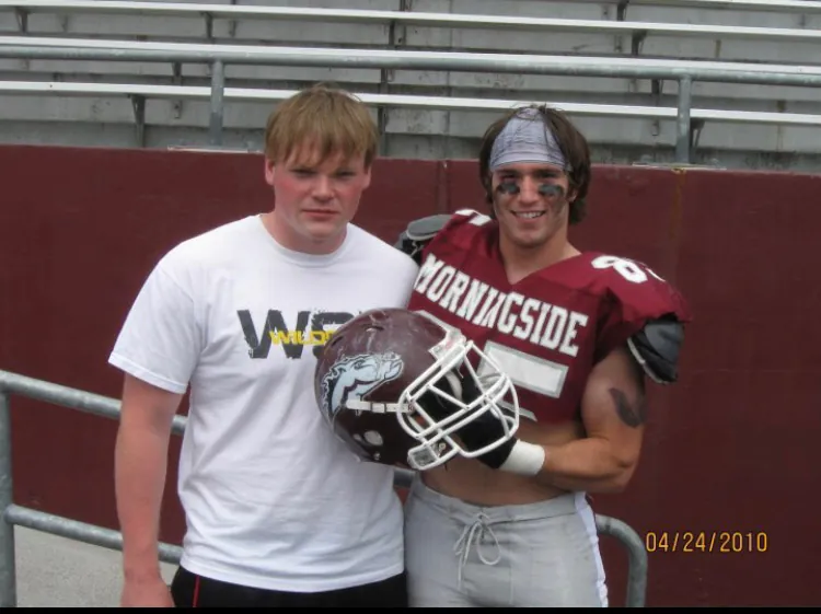 A young Ian Miner in his Morningside College football uniform beside a teammate