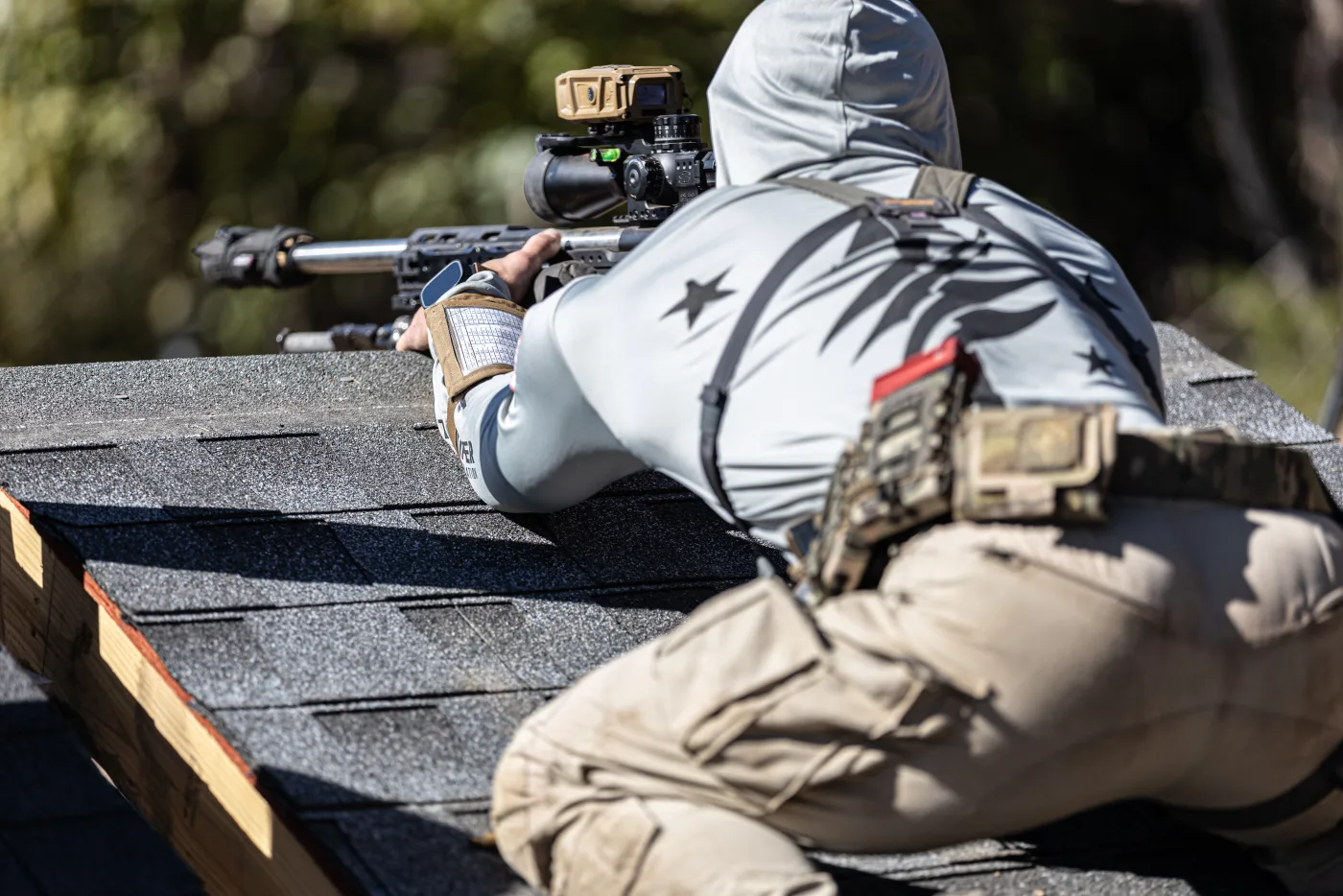 Matt Solowynsky prone on a rooftop shooting position during a PRS match