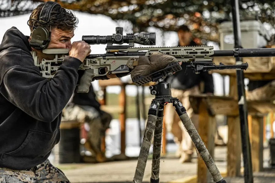 Steve Holland behind a tripod-mounted precision rifle at the Recon Sniper Course