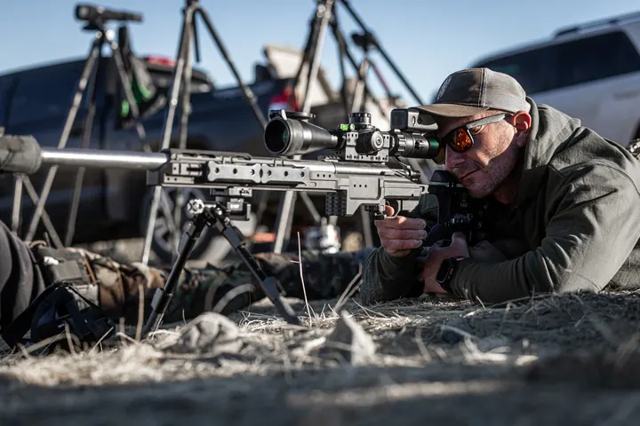 Matt Solowynsky prone behind a precision rifle on a bipod